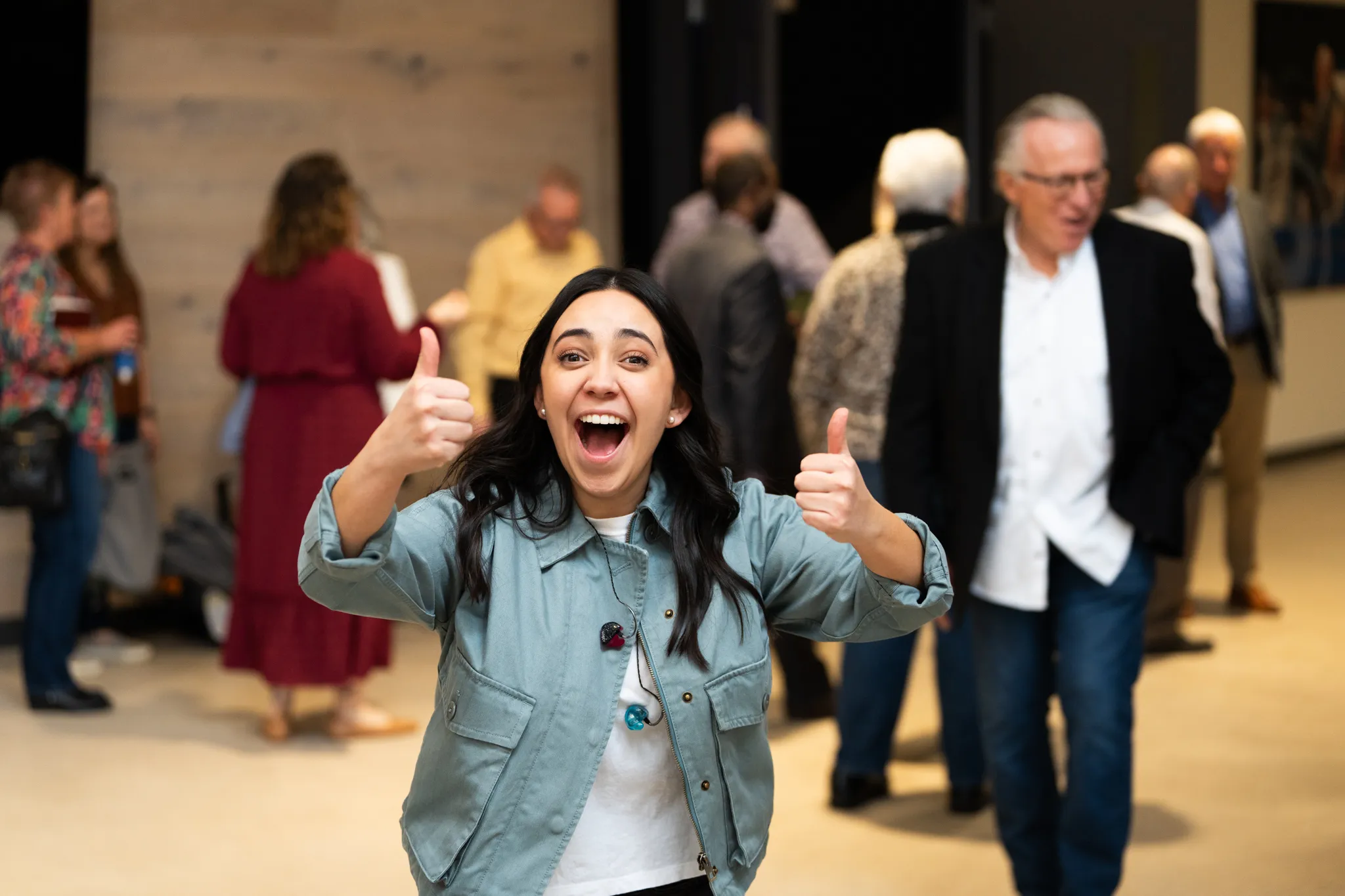 an image of a family of 7 during an event at reach church