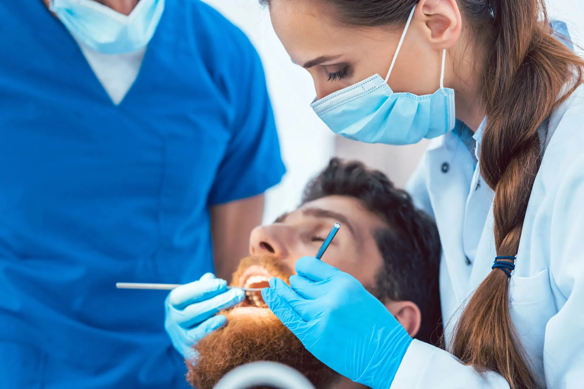 Family Dentist Issaquah checking patient's teeth