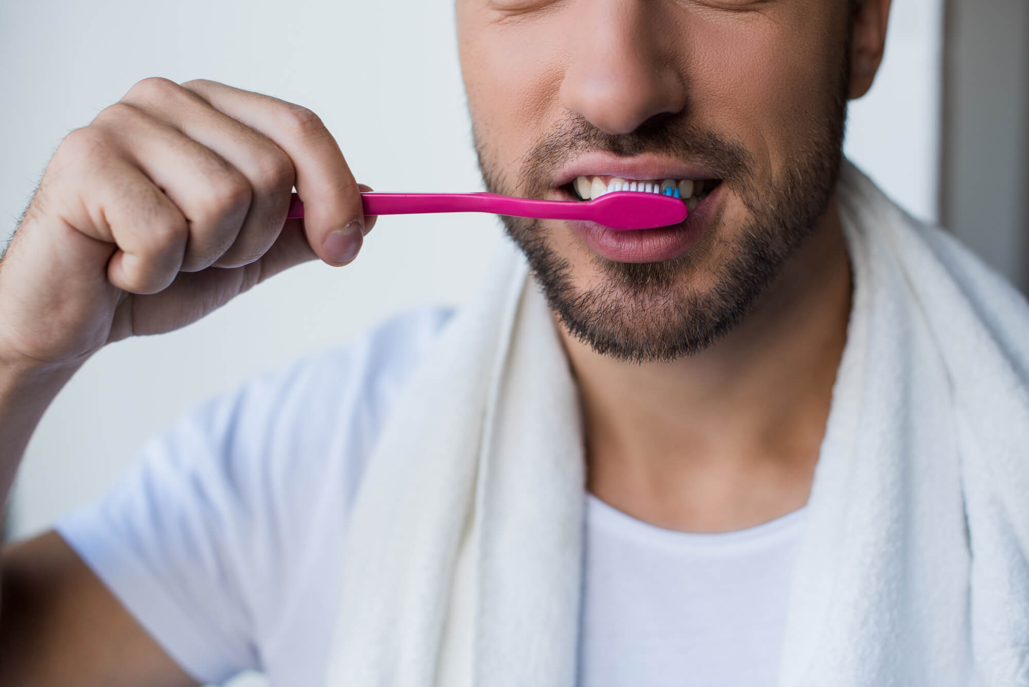 Man brushing his teeth General Dentist Issaquah