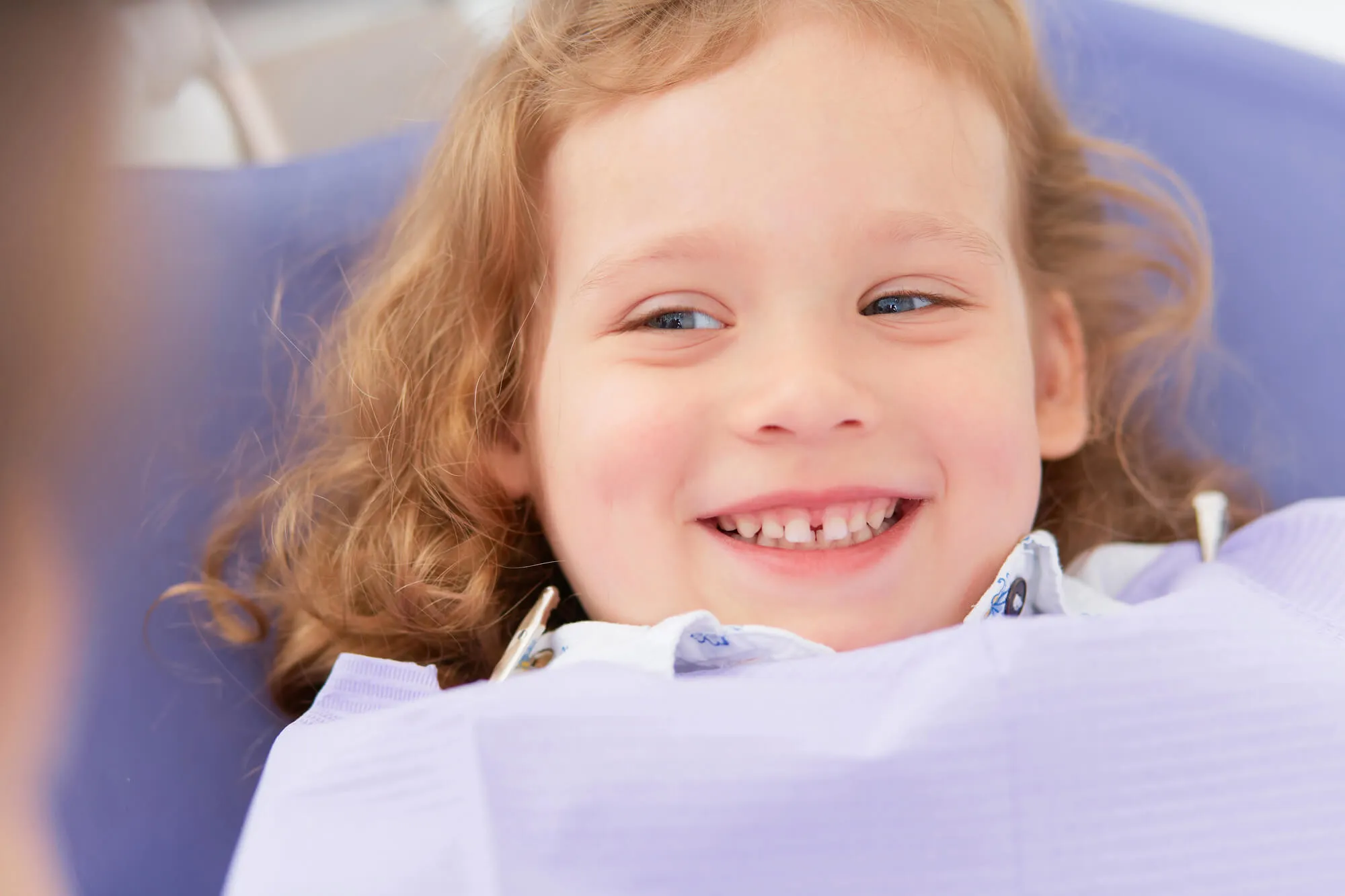 patient smiling at pediatric dentistry Issaquah