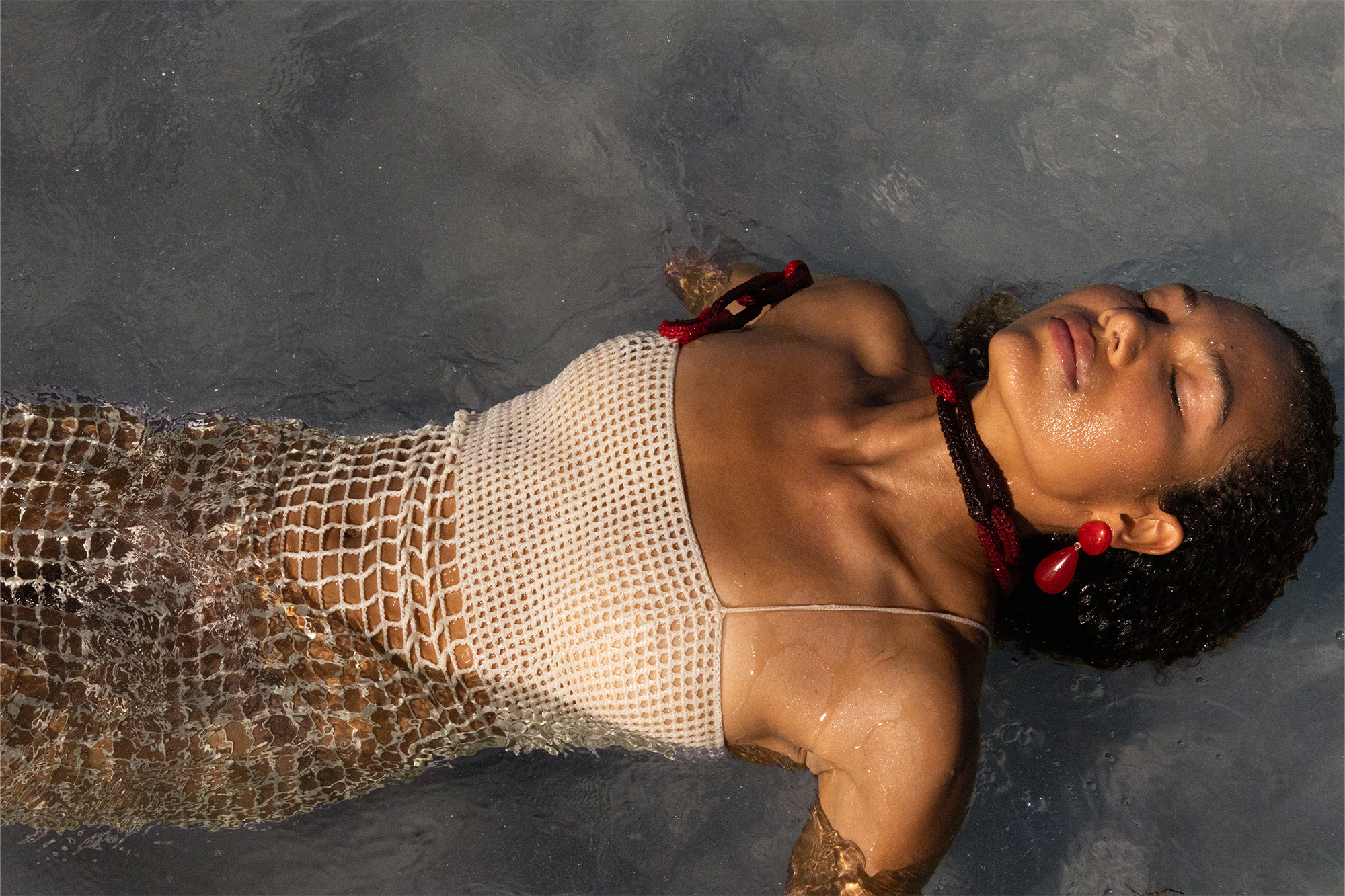 Leli dress being worn on a model at the beach