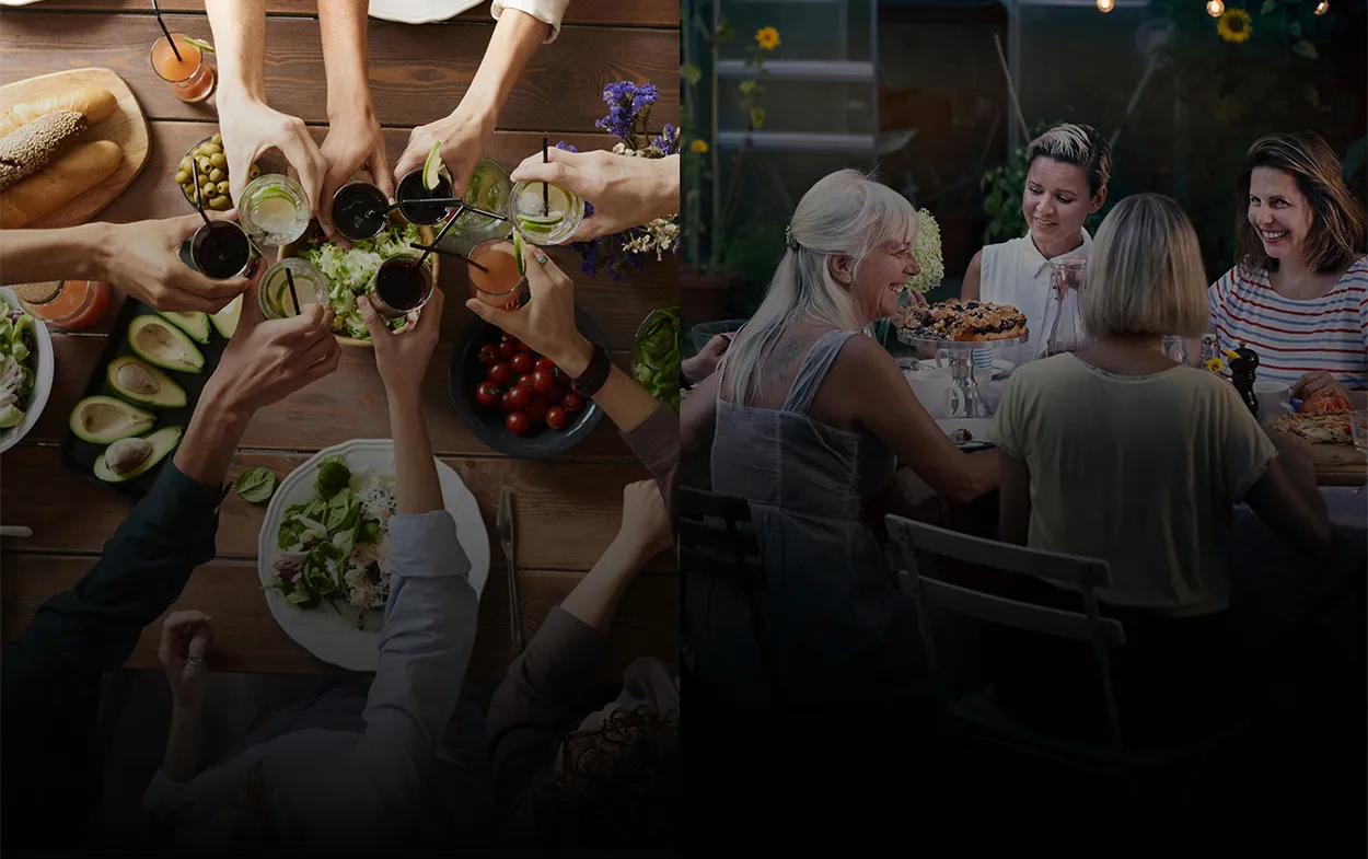 Top view of people toasting with drinks over a table with salad, avocados, rolls, and tomatoes; next to a group of four women smiling and chatting around a dinner table with a cake and flowers.