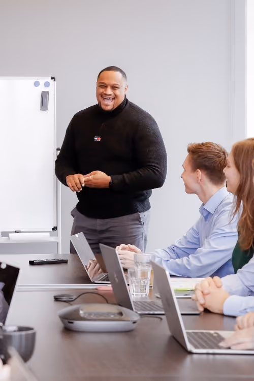 A man giving a presentation to a group of people