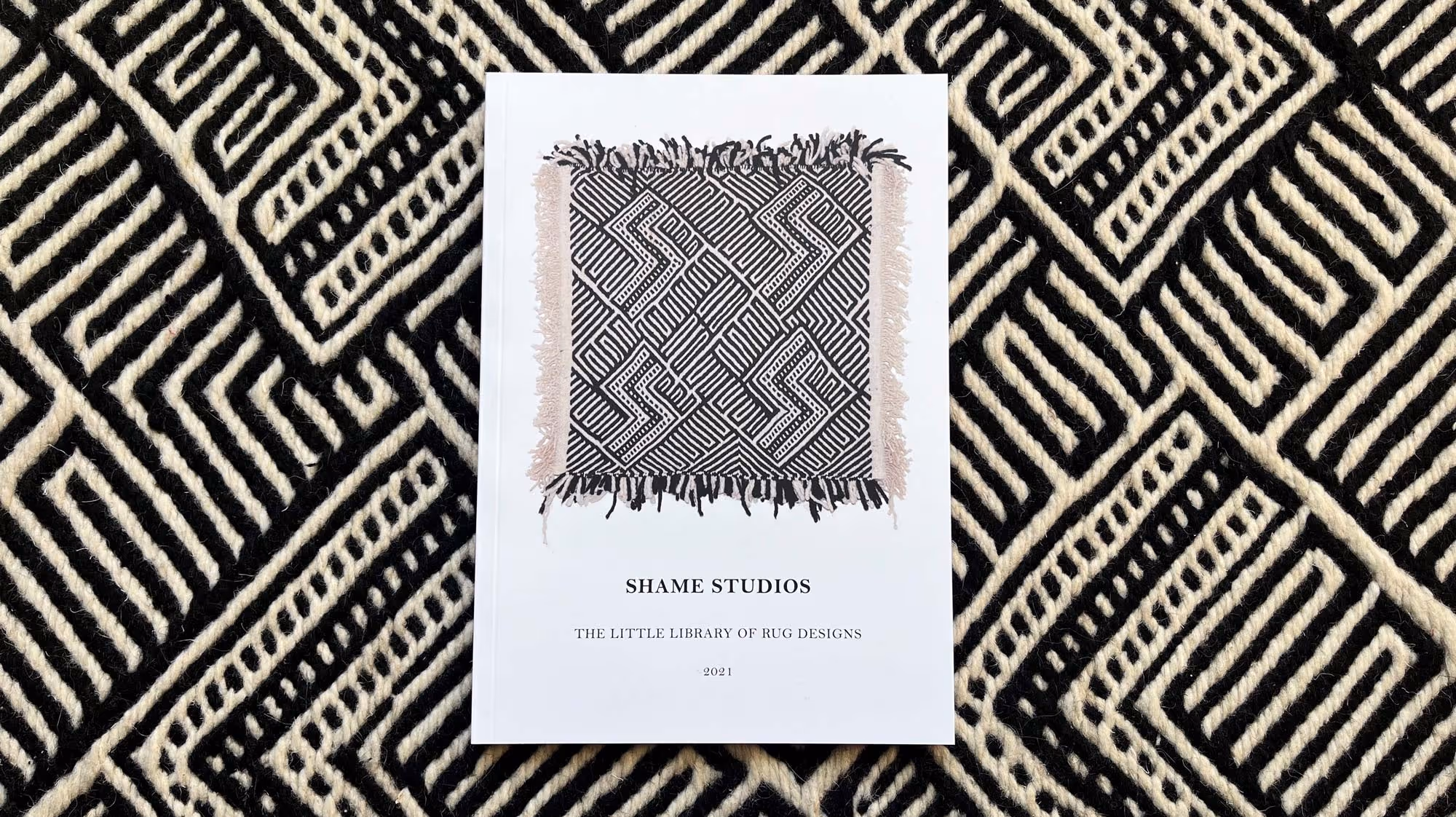 Photography of The Little Library of Rug Designs by Shame Studios