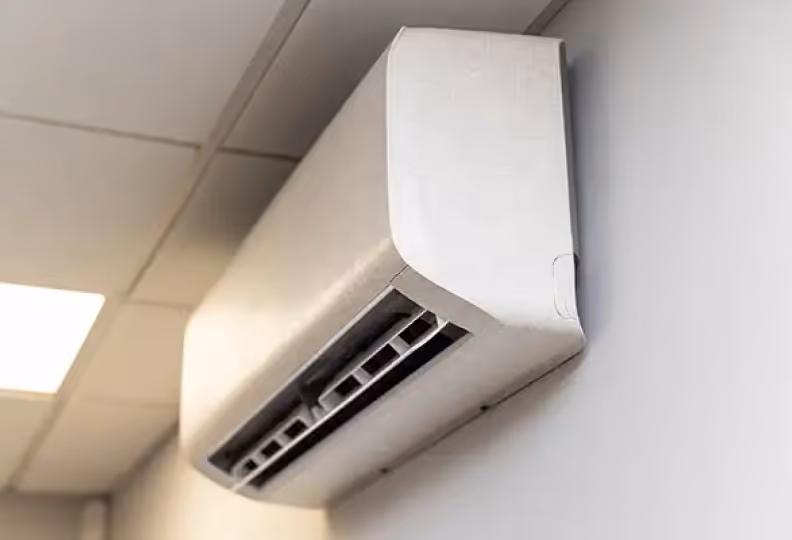 The Urban Compact air conditioning wall unit in ivory colour