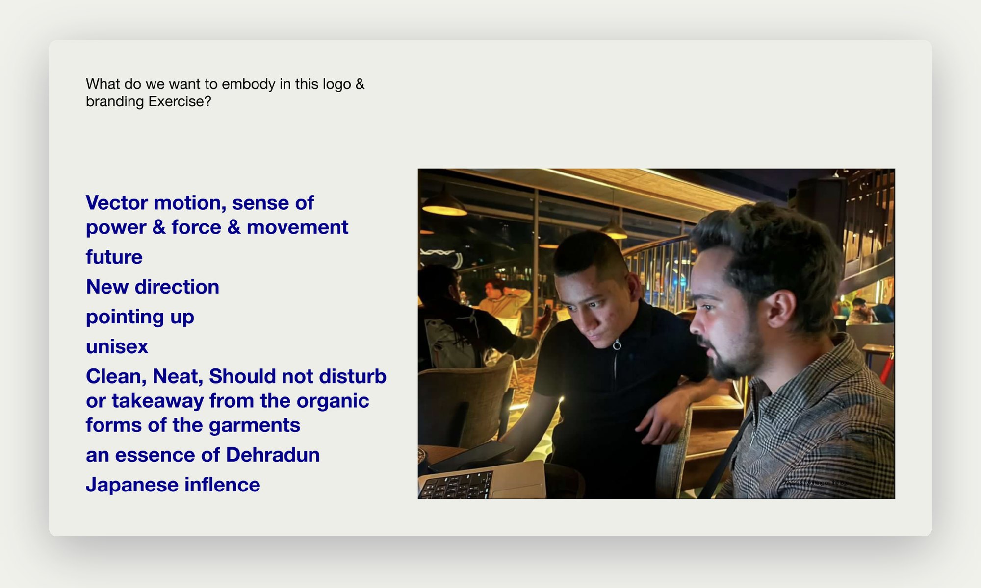 Slide listing what the logo should embody, with Akash and me at work