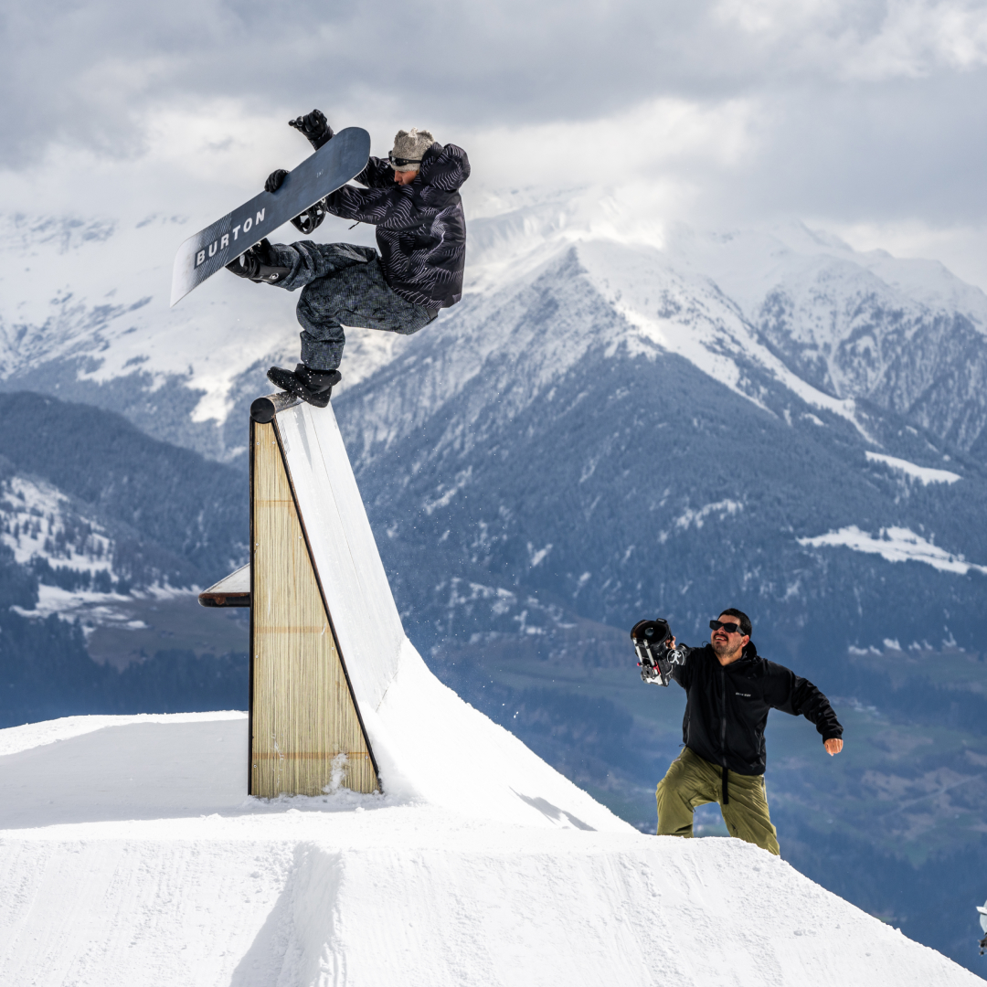 Snowboarder doing a trick in the LAAX snowpark
