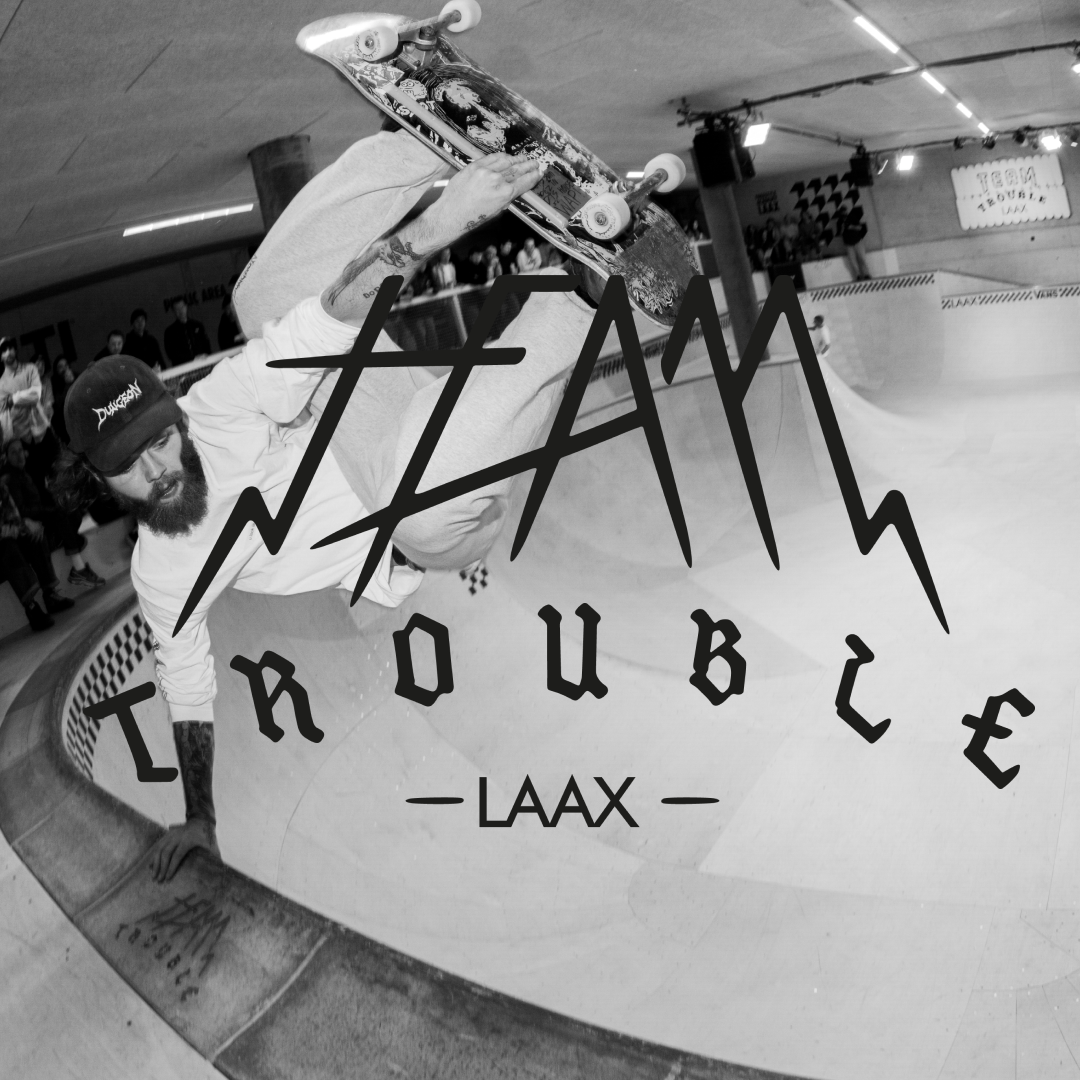 Team Trouble logo and photo of a skateboarder