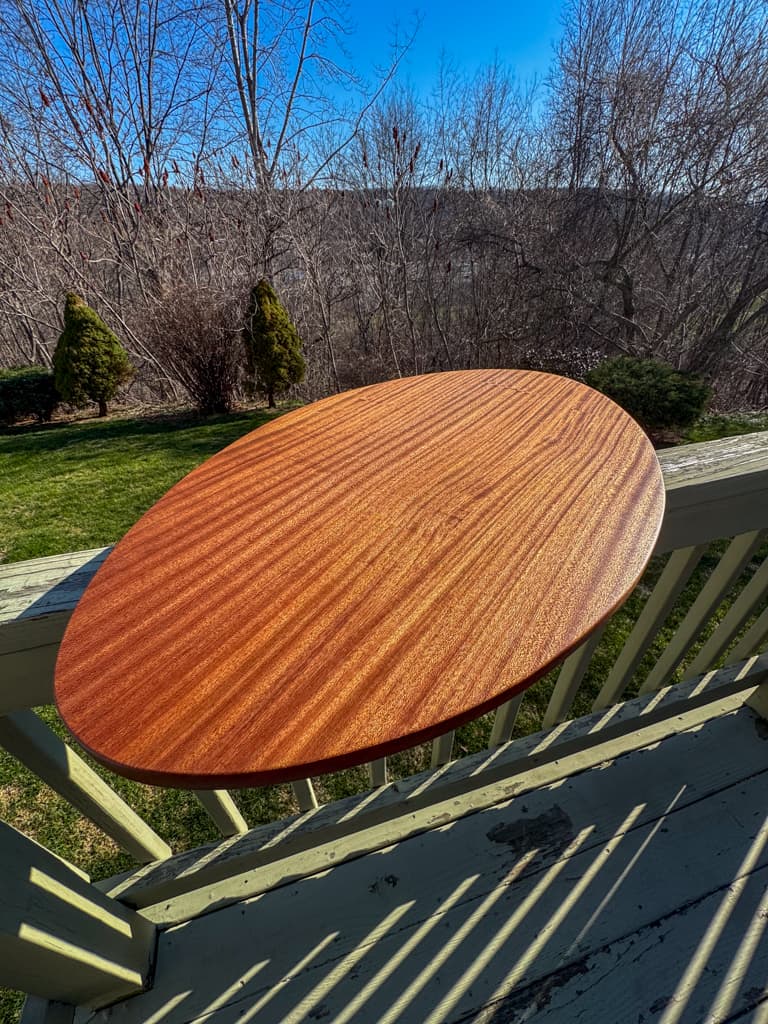 Solid wood table for a boat made out of sapele