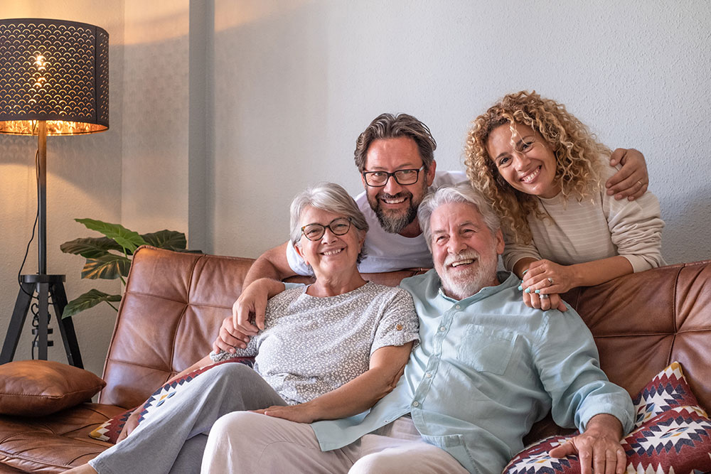 Group of adults posing for photo