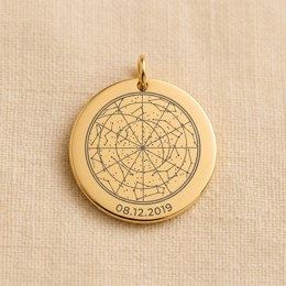 Coin engraved with a star map and a date