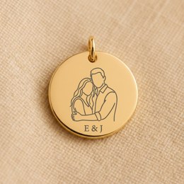 Coin engraved with a line-art portrait of a couple