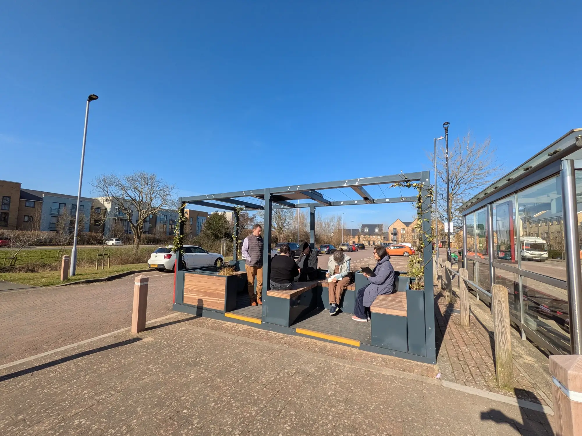 Lyde Green Park & Ride mobility hub seated area with planters