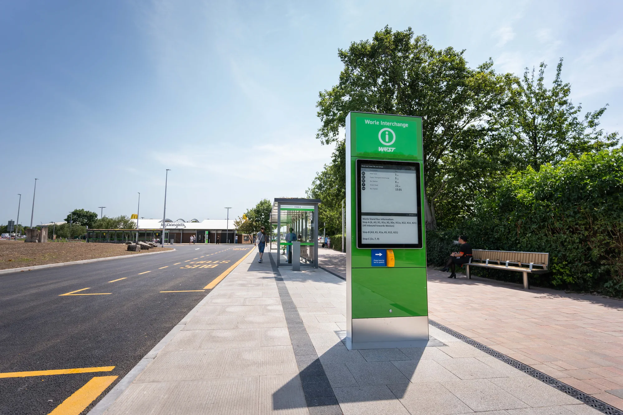 Digital real-time bus schedule display totem at Worle Interchange.