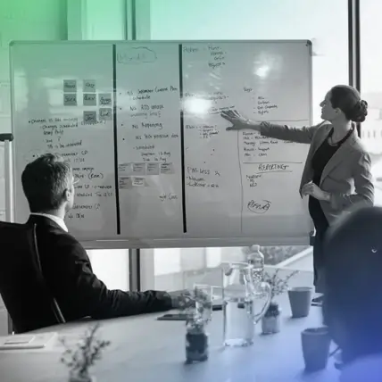 Close-up of a professional taking notes.