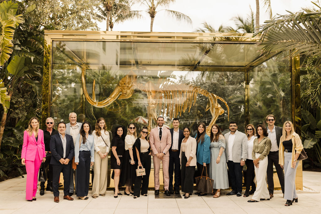 Image event in front of a golden mammoth Digital Hotel Marketing Agency