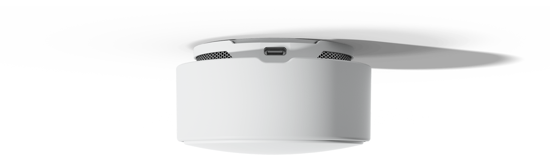 Minut Home Sensor with the usb-c port facing the viewer
