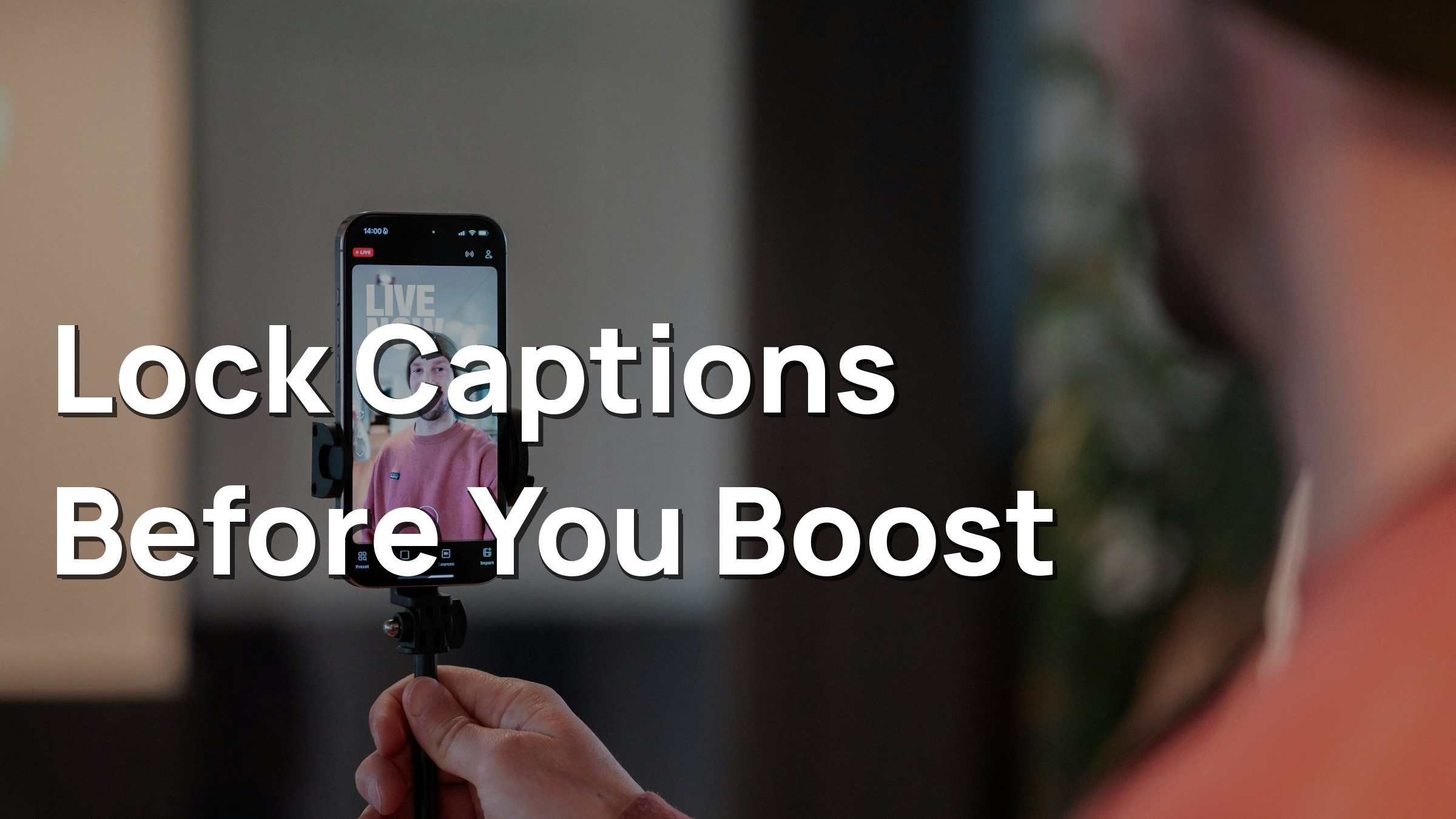 Creator filming a live social post on a smartphone mounted on a handheld tripod, the organic seed asset you lock a caption on before Spark authorization.