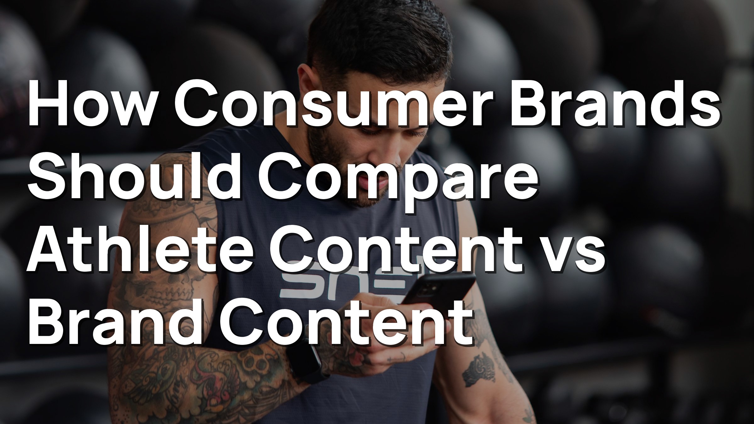 Anonymous athlete in a gym checking a smartphone, representing athlete-generated social content versus polished brand creative