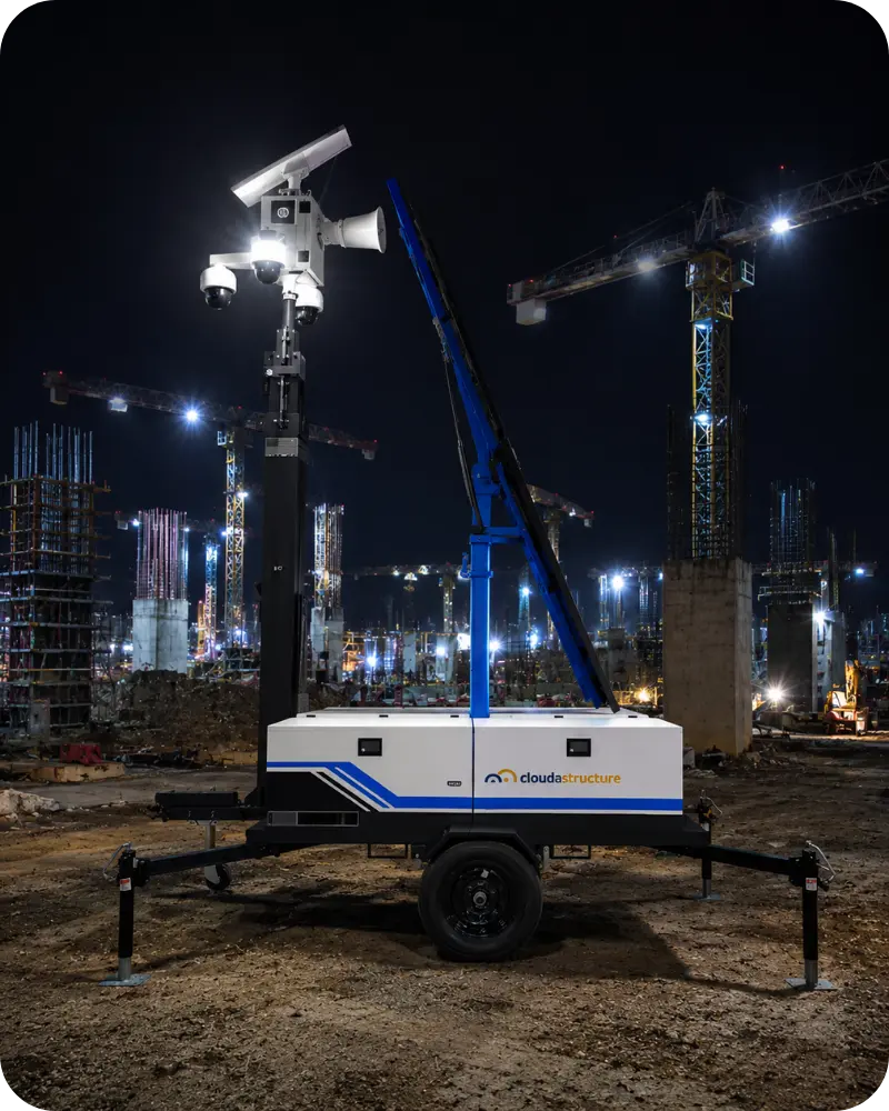 Remote security guard monitoring AI surveillance alerts in real time using cloud-based video security software.