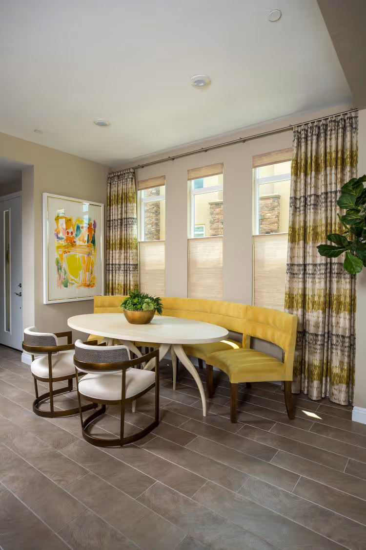 Kitchen breakfast nook with half round seating bench.