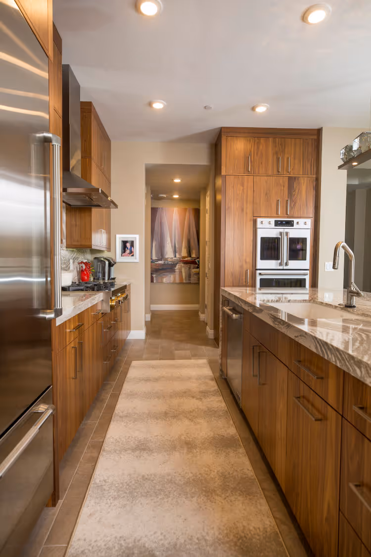 Condo Kitchen remodel with modern cabinets and stone countertops.