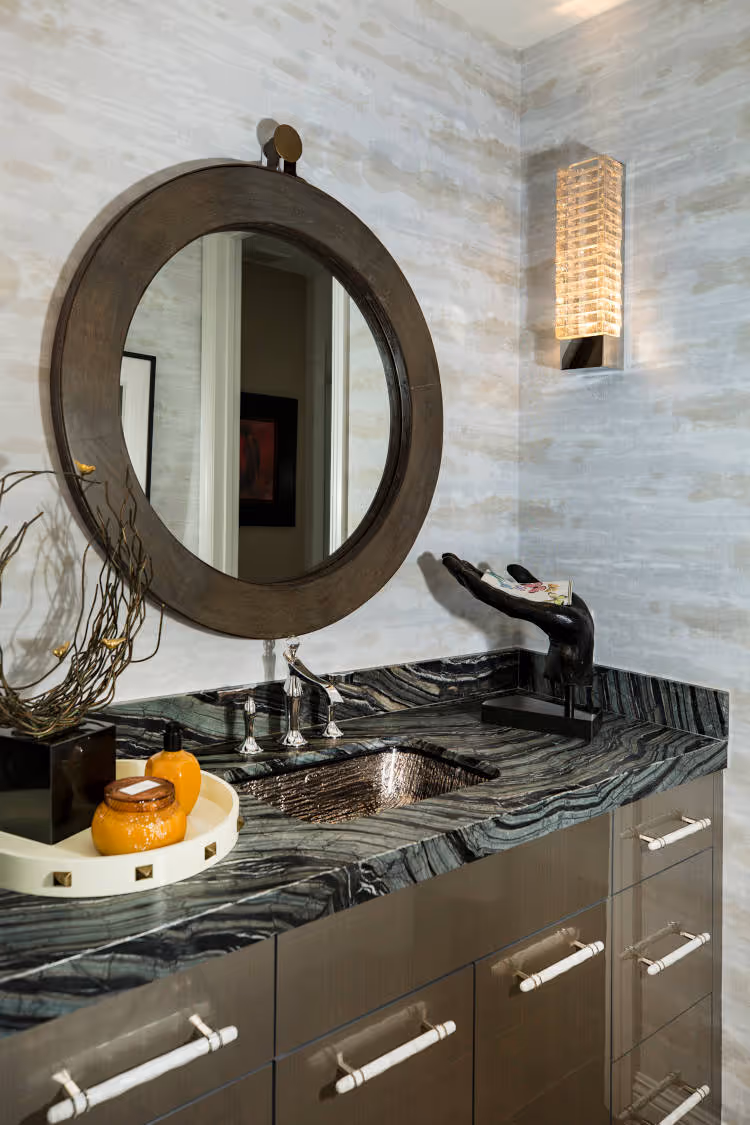 Guest bath remodel with wooden rounded mirror.