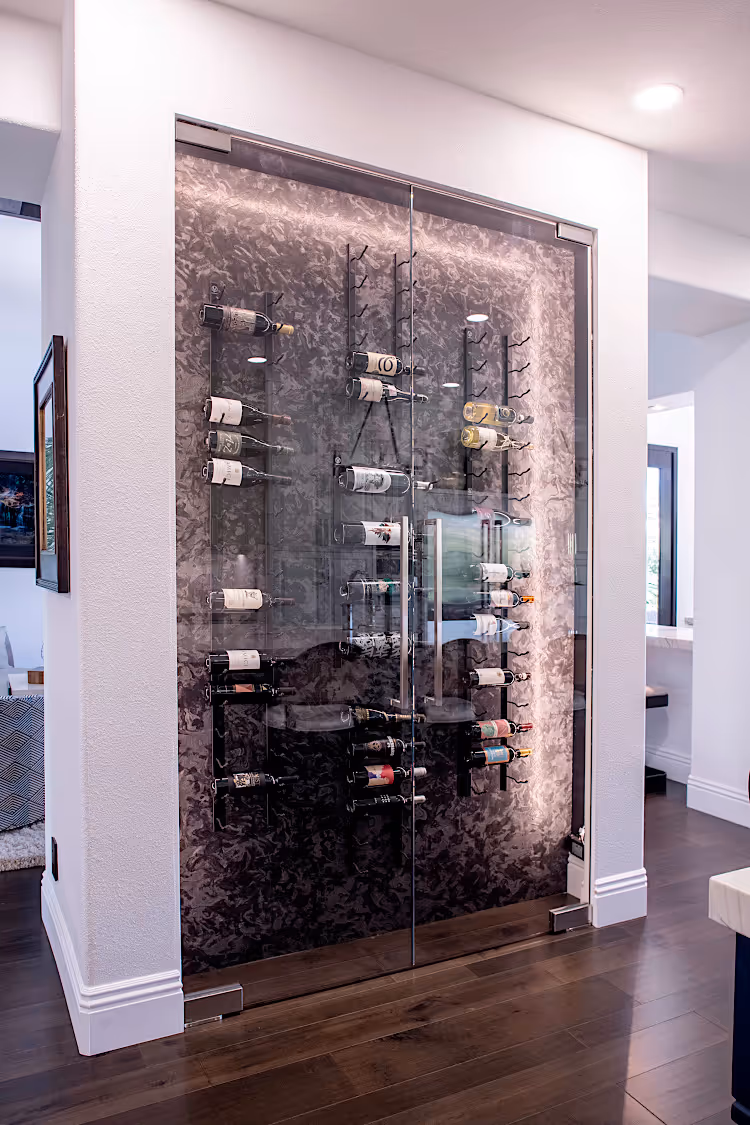 Build in win wall storage with double glass doors.