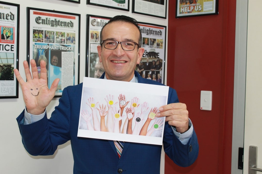 Local MP Tony Piccolo “waving appreciation” to local volunteers.