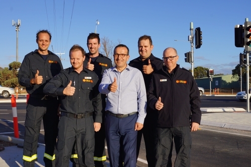 Members of the Dalkeith CFS (with local MP Tony Piccolo) give the new traffic lights the thumbs up.