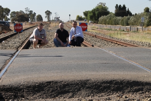 Tony Piccolo MP with local residents (from left) Matt Gaffney and Paul Blaser at the crossing.