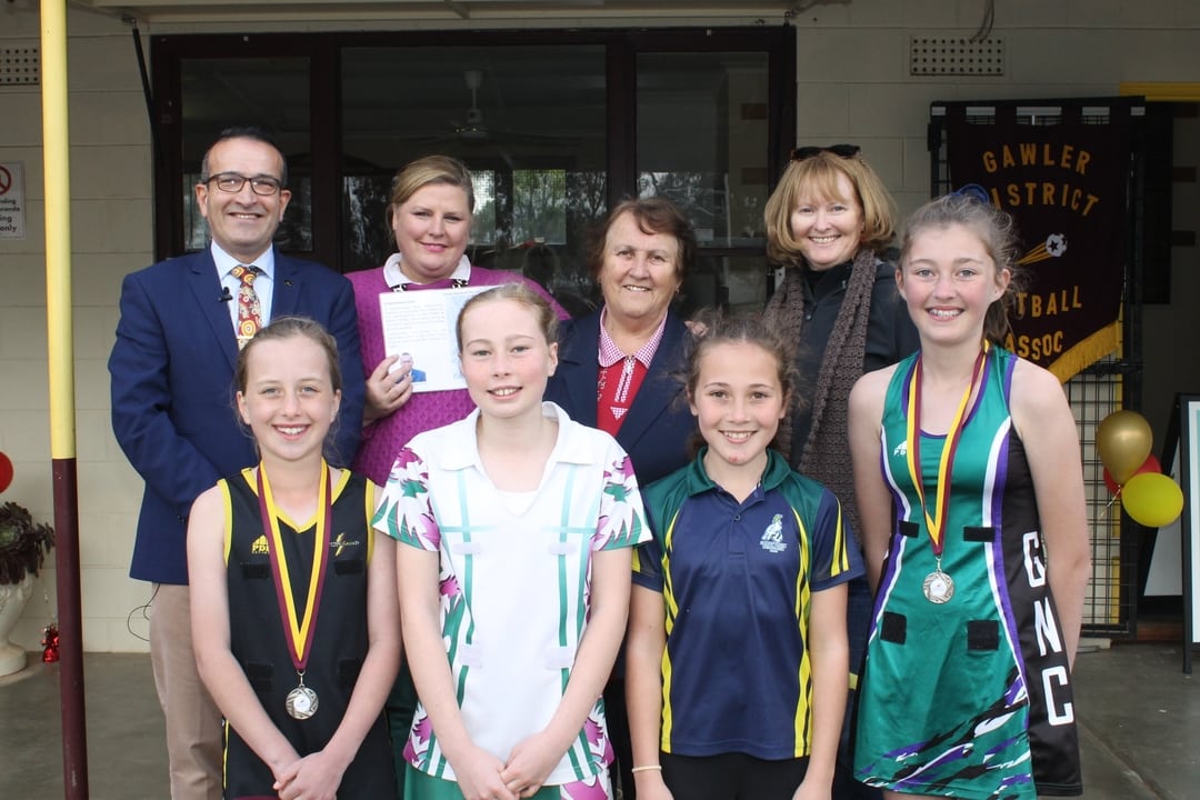 Photo: at the announcement were: (Back Row) Member for Light Tony Piccolo, GDNA President Kylie Forby, Patron Mrs Yolanda Cannizarro, and Gawler Mayor Karen Redman. (Front Row) (from left) Pippa Batki (Xavier Saints), Alice Costigan (Virginia), Ayla Beaucaris (Sandy Creek) and Haley Cornwall (Gumnuts).
