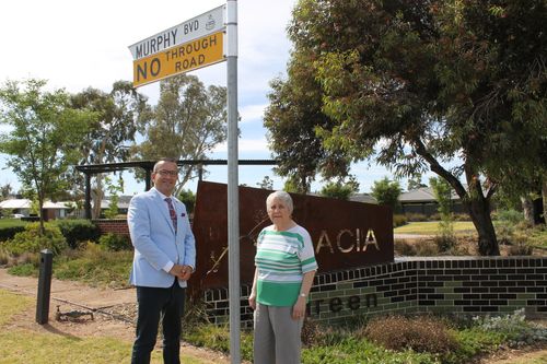 Mrs Anne Hausler and Tony Piccolo MP on the site of the former Evanston Primary School