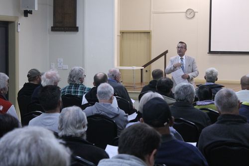Tony Piccolo MP addressing residents at the meeting held last Wednesday in the Evanston Memorial Hall