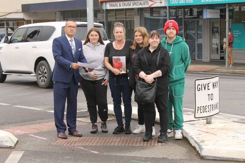 At the intersection where Ms Read was killed, Tony Piccolo MP announcing the new measures with (from left) Jade, Ms Sharon Humphreys, Chloe, Grace Mulyk and Matthew.