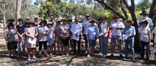 Local MP Tony Piccolo with some of the residents who attended the community meeting on Saturday morning.
