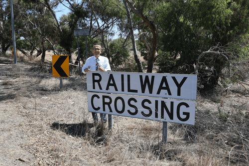 Local MP Tony Piccolo at the Railway Crossing near the Concordia Road/Barossa Way intersection.