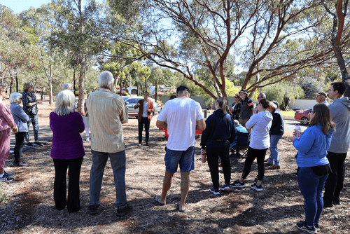 Local MP Tony Piccolo addressing residents at the community meeting held on Hemaford Grove Reserve on Saturday.