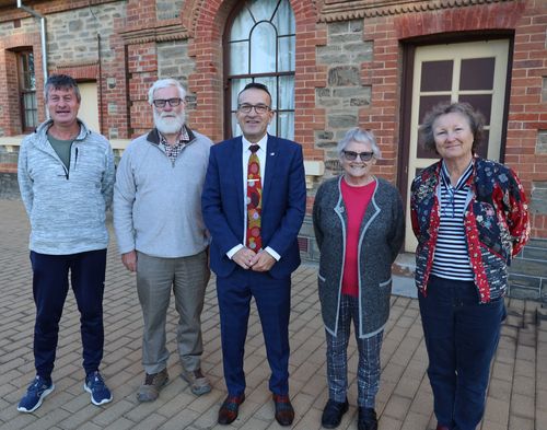 With Tony Piccolo MP are local residents who want to know what is happening with the historic canopy at the Gawler Railway Station – from left – Brett Fitzpatrick, Adrian Shackley, Sue Coldbeck and Judy Gillett-Ferguson.