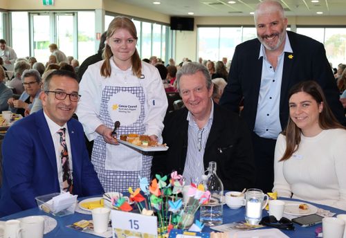 Year 11 student, Karlia Ayris serving (from left) Tony Piccolo MP, Media personality Graeme Goodings, and Dean Parker and Jess Alexander from the Cancer Council the Gawler Cancer Council Biggest Morning held during the week at The Terrace function centre at the Gawler Racecourse. PICTURE by Cohen Mortimer.