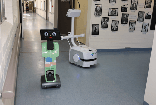 Two of the robots at Tanunda Lutheran Homes at work.