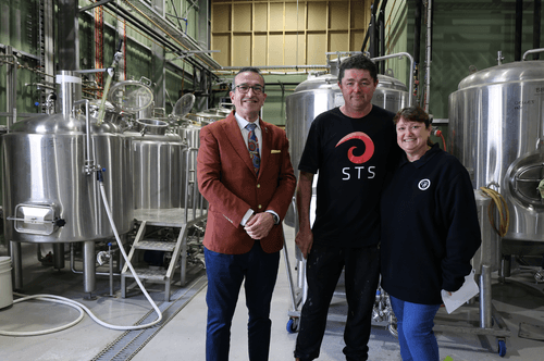 Tony Piccolo MP touring the brewing area with craft creator Aaron Howse and his wife Diane Howse.
