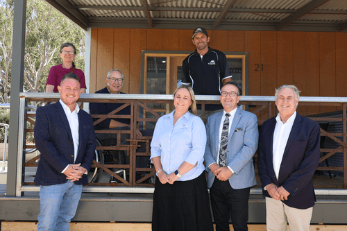 Showcasing the accessible cabins are - Back Row (L-R): Mandy Gibb, Tony Wilson (Cabin Designer), Brad Valentine (Owner). Front Row (L-R): Deputy Mayor Michael Phillips-Ryder, Emma Valentine (Owner), Tony Piccolo MP, Senator the Hon. Don Farrell (Minister for Trade and Tourism).