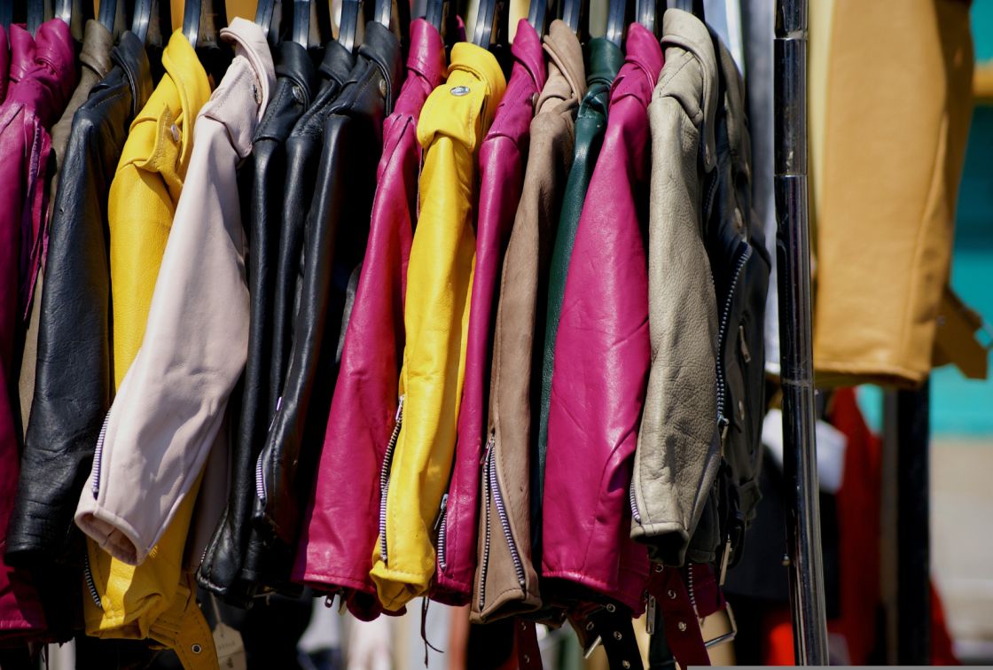 A rack of colorful clothes.