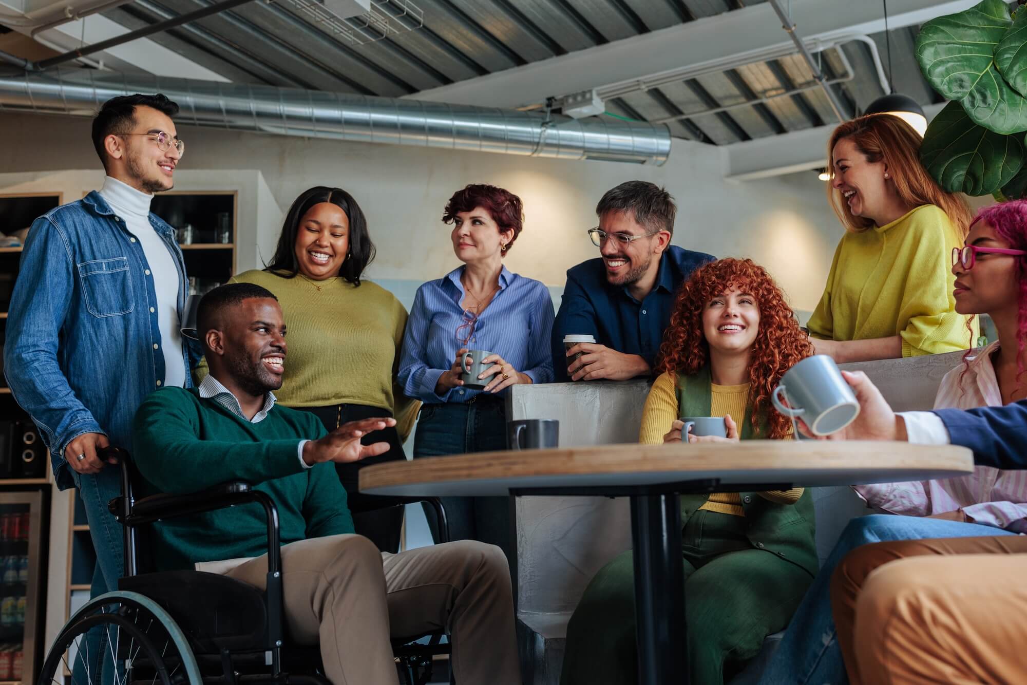 Diverse business team enjoying coffee break together