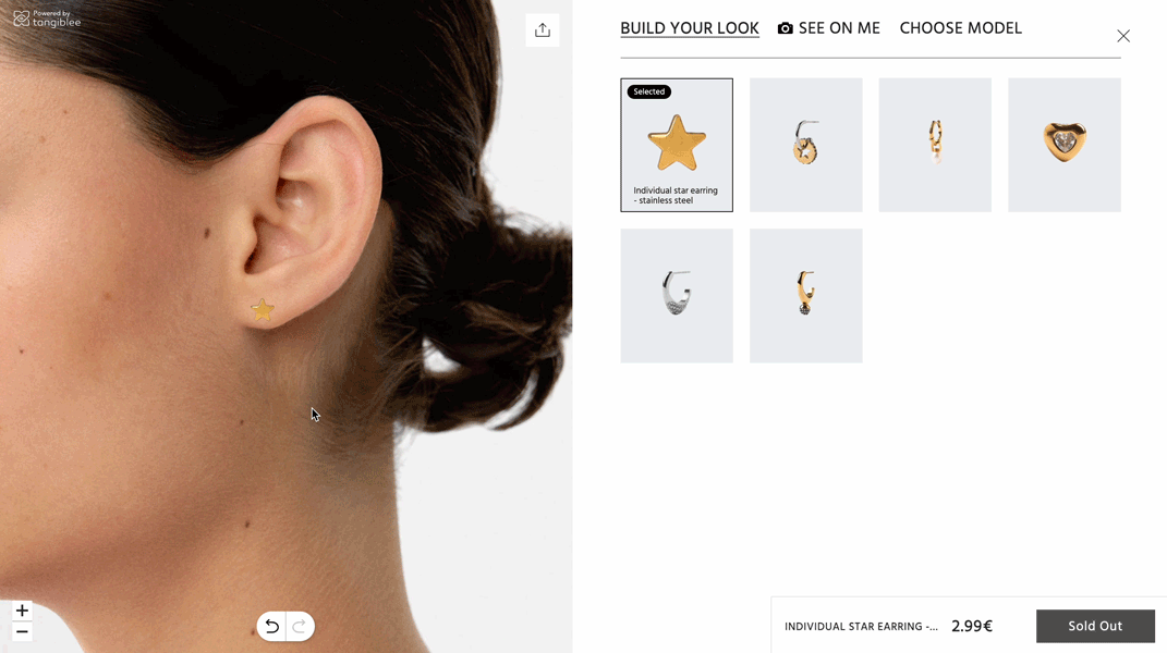 Earrings stacking on a models ear