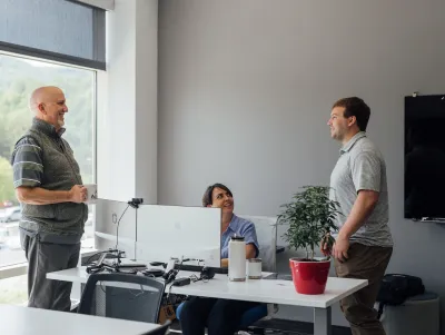 team meeting in well lit office