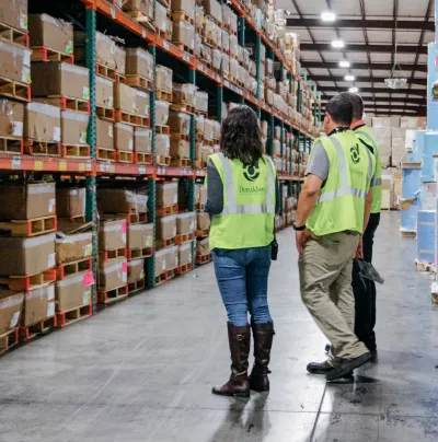 team members walking warehouse