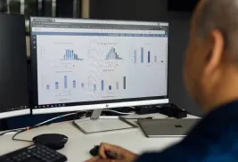 man at desktop monitor