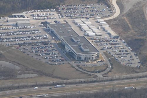Bird's eye view of the Covenant Logistics headquarters and semi trucks
